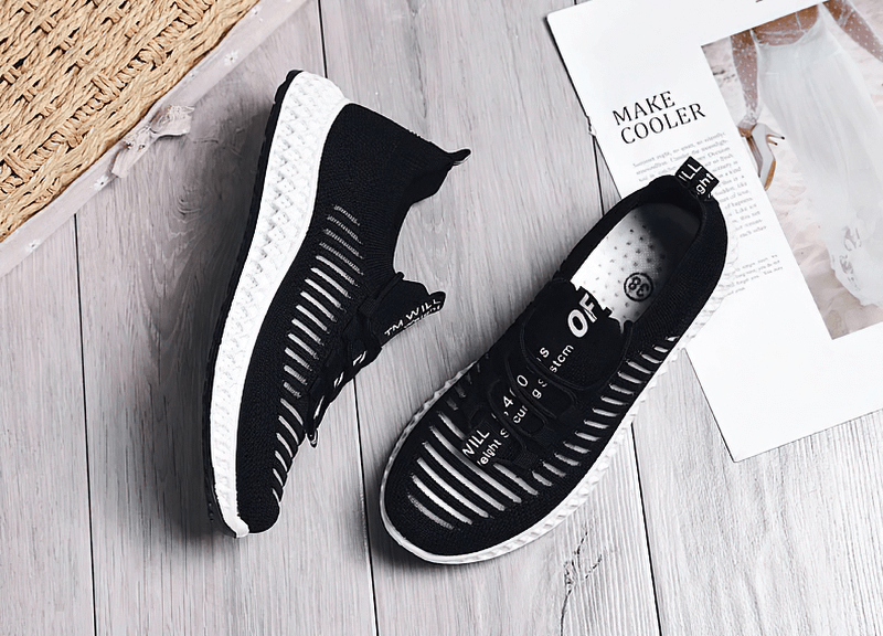 Black mesh breathable women's sneakers with lace-up closure, flat bottom design, perfect for walking and casual wear. Style SF0265.